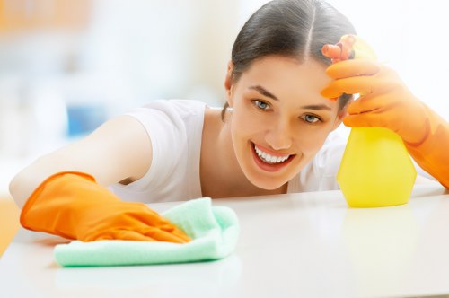 Carpet cleaning technician preparing equipment for a scheduled service